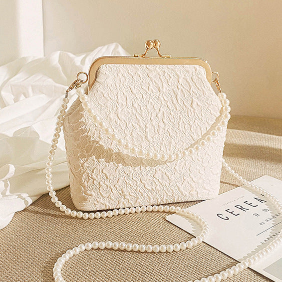 Foreign trade mobile phone bag 2026 new cloud qipao women's bag pearl chain crossbody bag Japanese mouth gold makeup bag