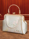 Chinese style silk embroidery cheongsam bag for women 2026 new crossbody dumpling bag, new Chinese style mouth gold bag handbag