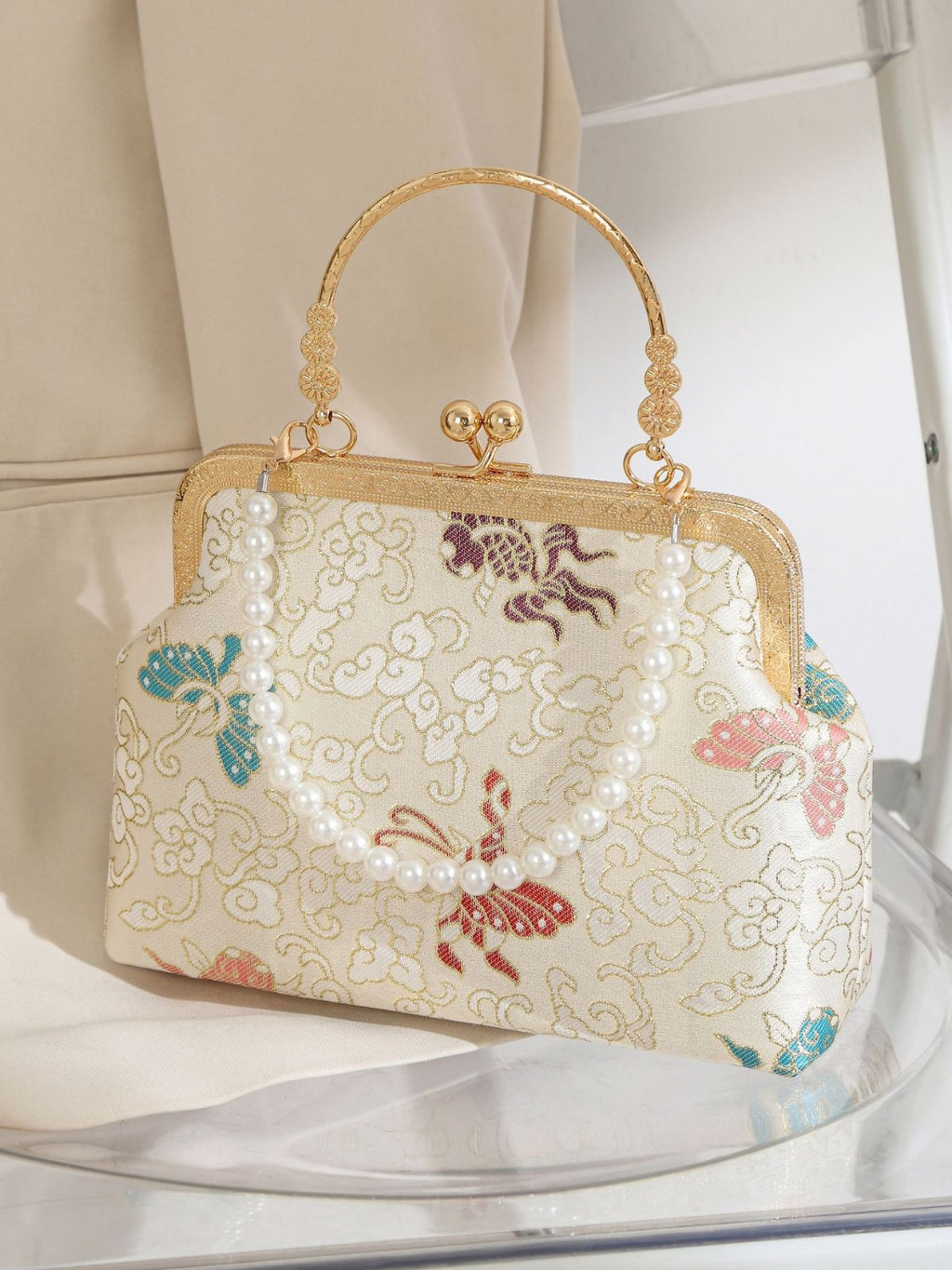 New women's bag for spring and summer 2025, crossbody bag with butterfly pattern, high-end feeling, new Chinese style bag, evening bag wholesale